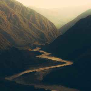 river flowing in mountains