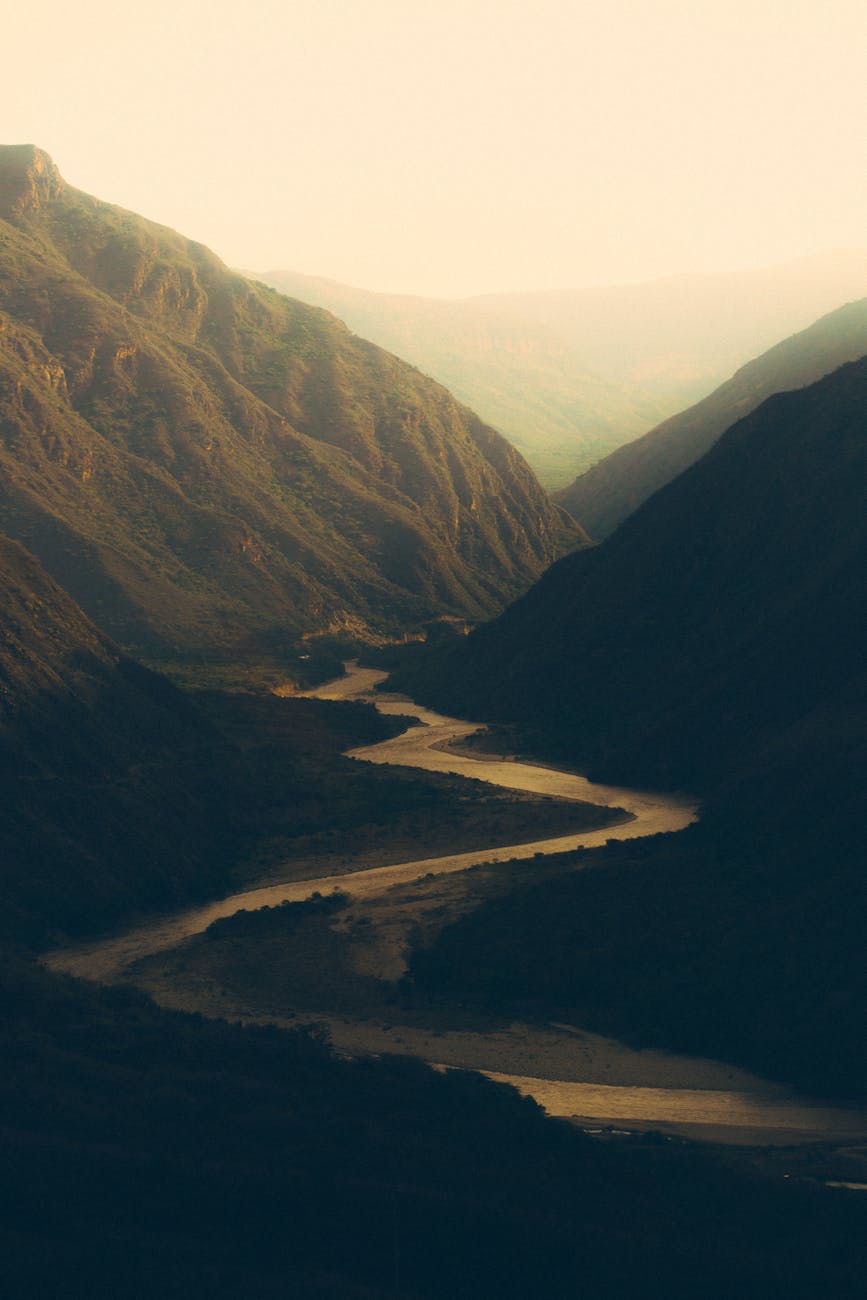 river flowing in mountains